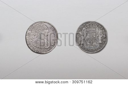 Cartagena, Spain - September 14th, 2018: Silver Spanish Pieces Of Eight Or Charles Iii Escudos, Mint