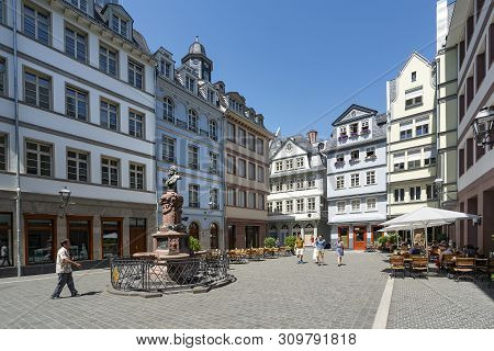 Frankfurt, Germany. July 2019.   The Friedrich-stoltze-brunnen Fountain In The Hühnermarkt Square In