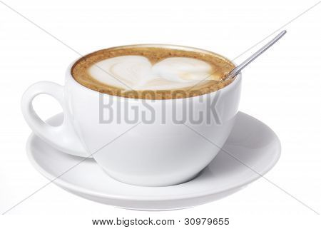 Hjertet trukket ind i Latte med skeen.