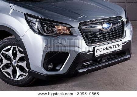 Novosibirsk, Russia - June 28, 2019:  Silver Subaru Forester, Close-up Of The Headlight, Bumper, Whe