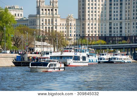 Moscow, Russia - May 6, 2019: A View Of The High-rise On Kotelnicheskaya Embankment And A Lot Of Ple