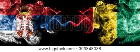 Serbia Vs Guinea, Guinean Smoky Mystic Flags Placed Side By Side. Thick Colored Silky Smokes Combina