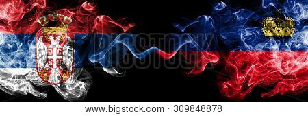 Serbia Vs Liechtenstein, Liechtensteins Smoky Mystic Flags Placed Side By Side. Thick Colored Silky 