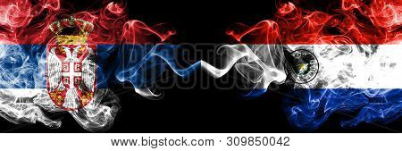 Serbia Vs Paraguay, Paraguayan Smoky Mystic Flags Placed Side By Side. Thick Colored Silky Smokes Co