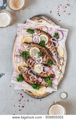 Grilled Skimmer Breams With Red Onions, Herbs And Beer