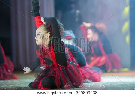 A Little Girl Performs A Dance Number.little Girl Dancing