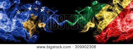 Kosovo Vs Congo, Congolese Smoky Mystic Flags Placed Side By Side. Thick Colored Silky Smokes Combin