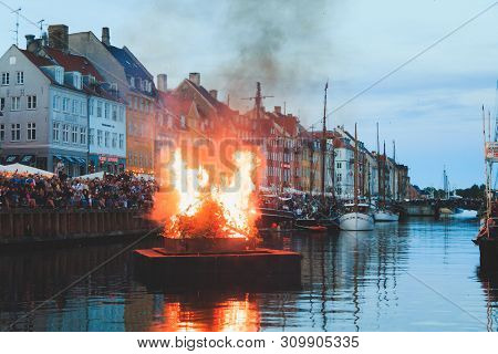 Copenhagen, Zealand Denmark - June 23 2019: Burning The Witch On Bonfire The Middle Of Nyhavn Canal 