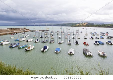 Pretty New Quay Harbour In The County Of Cardigan In West Wales, Uk