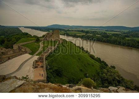 Danube, Bratislava, Slovakia: Beautiful Landscape With Devin Castle, Mountais And Danube River.