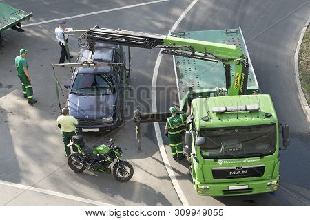 Moscow / Russia - May 2019: Evacuation Of The Car For The Wrong Parking. Paperwork And Loading. Imag