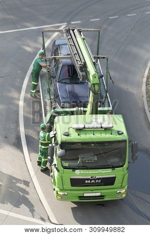 Moscow / Russia - May 2019: Loading And Towing A Car For Improper Parking. Image Can Be Used For Top