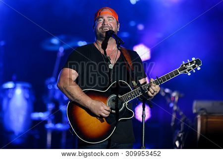 FARMINGVILLE, NY - JUL 3: Lee Brice performs in concert at The Fest at Long Island Community Hospital at Bald Hill on July 3, 2019 in Farmingville, New York.