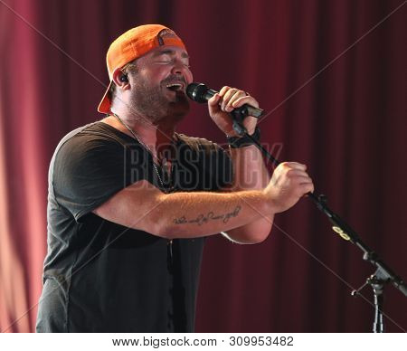 FARMINGVILLE, NY - JUL 3: Lee Brice performs in concert at The Fest at Long Island Community Hospital at Bald Hill on July 3, 2019 in Farmingville, New York.