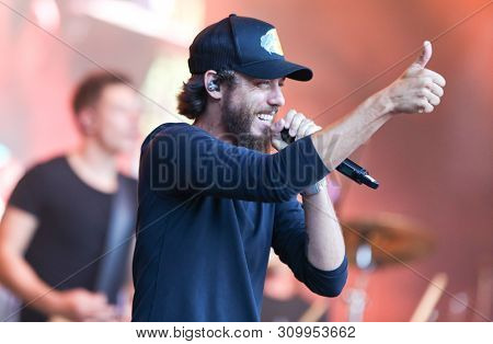 FARMINGVILLE, NY - JUL 3: Chris Janson performs in concert at The Fest at Long Island Community Hospital at Bald Hill on July 3, 2019 in Farmingville, New York.