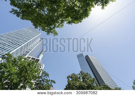 Frankfurt, Germany. July 2019.  Modern Skyscrapers In The Financial District Seen From Below.