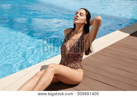 Image Of Fashion Woman Wearing Leopard Printed Bikini With Perfect Tanned Skin, Attractive Lady Sitt