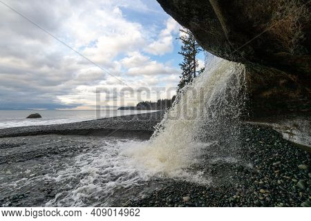 Waterfalls At On The Coast At Sandcut Beach, British Columbia, Canada