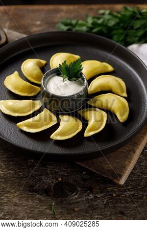 Appetizing Traditional Russian Dumplings Made By Hand With Delicious Filling. Still Life On A Wooden