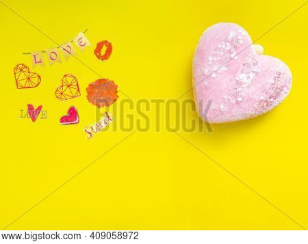 Concept For Love Stories And For Valentines Day. Gift Box In The Form Of A Heart On A Yellow Backgro