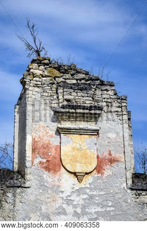 Ruins Of An Ancient Synagogue Against Cloudy Sky. Texture Of Old Dilapidated Masonry. Religious Symb