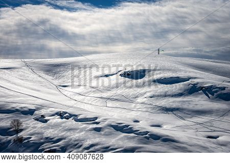 Altopiano Della Lessinia (lessinia Plateau) In Winter With Snow And Monte Tomba (tomb Mountain), Reg