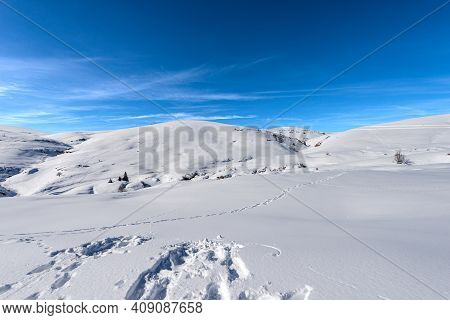 Altopiano Della Lessinia (lessinia Plateau) In Winter With Snow And Monte Tomba (tomb Mountain), Reg