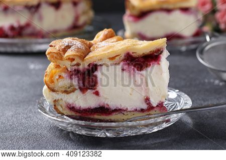 Piece Of Cake Karpatka With Cherries Close-up, Traditional Polish Cream Pie On Dark Background.