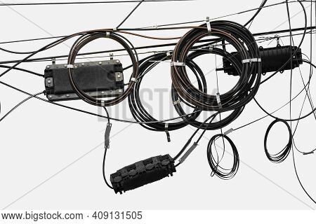 Cable Wires On The Electric Poles Are Tangled On White  Background , Bangkok Thailand.