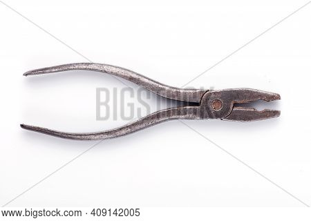 Old Pliers. Pastizzi On A White Plate Close-up.