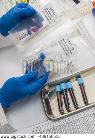 Nurse Comparing Positive Covid-19 Test Results Of Infected Persons, Procedure And Selection Of Oroph