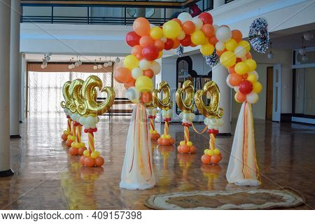 An Arch Of Multi-colored Balloons. Decor Of Balloons. Place Of The Wedding Ceremony.