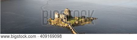 Eilean Donan Castle Aerial View From Above At Sunrise