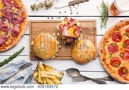 Elicious Burger With Sauce. Hamburger. Delicious Grilled Angus Burger With Cheese, Salad And Tomatoe