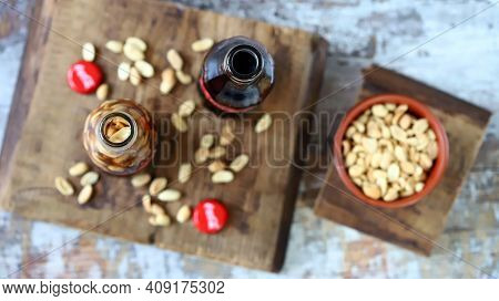 Coca Cola Bottles With Peanuts. Traditional American Snack.