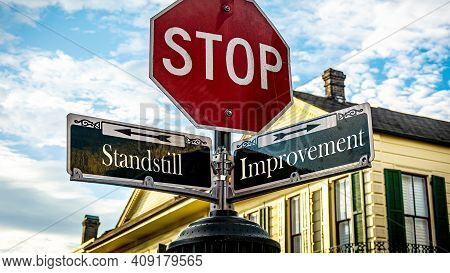Street Sign The Direction Way To Improvement Versus Standstill