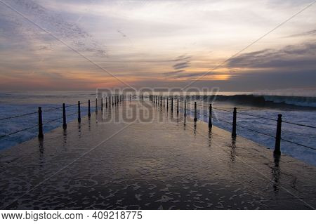 Sunset On A Cloudy Day At Porto