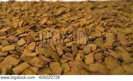 Delicious Rusks In A Pile. A Pile Of Rye Rusks. Bread Rusks At The Factory.