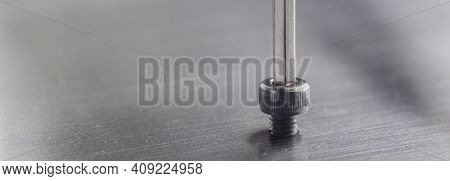 Hex Wrench Screw Hex Bolt In Metal Steel Plate. Spanner, Bolt, Screw And Nuts.