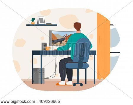 Male Character Is Playing Computer Game At Home. Young Man Sitting At Desk And Enjoying Online Gamin