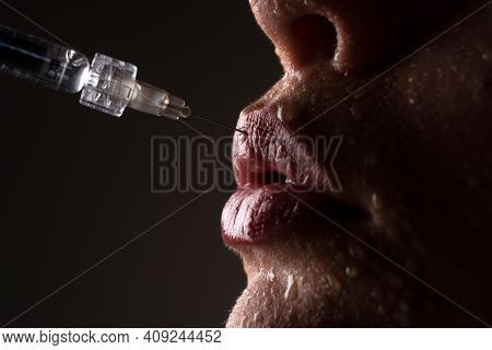 Lips Cosmetology. Hyaluronic Acid Injection. Procedure Of Lip Augmentation. Syringe Female Mouth