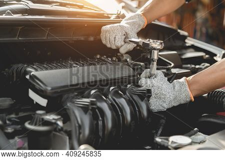 Automobile Mechanic Repairman Hands Repairing A Car Engine Automotive Workshop With A Wrench, Car Se