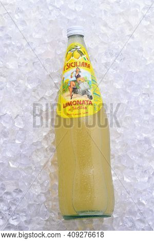 IRVINE, CALIFORNIA - DEC 10, 2018: A  bottle of A Siciliana Limonata, a carbonated lemon soda from Italy, on ice.