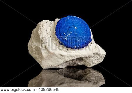 Macro Mineral Stone Azurite In Siltstone Against Black Background