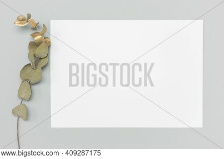 White Invitation Card Mockup With A Dried Grass Decoration On A Neutral Table. 5x7 Ratio, Similar To