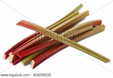 Pile Of Thick Reddish Stalks Of Rhubarb (rheum Rhaponticum) Isolated On White Background.