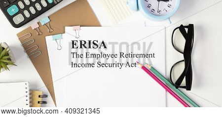 Stethoscope On Notebook And Pencil With Erisa The Employee Retirement Income Security Act Words As M