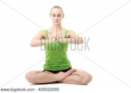 Young Blond Hair Woman In Yoga Pose Siddhasana Isolated On White Background