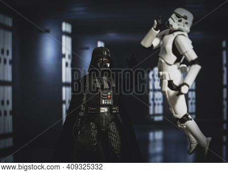 FEB 20 2021: Star Wars Sith lord Darth Vader force choking a disobedient Stormtrooper - Hasbro action figure