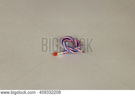 Flexible Pencil On A Light Background. Selective Focus
